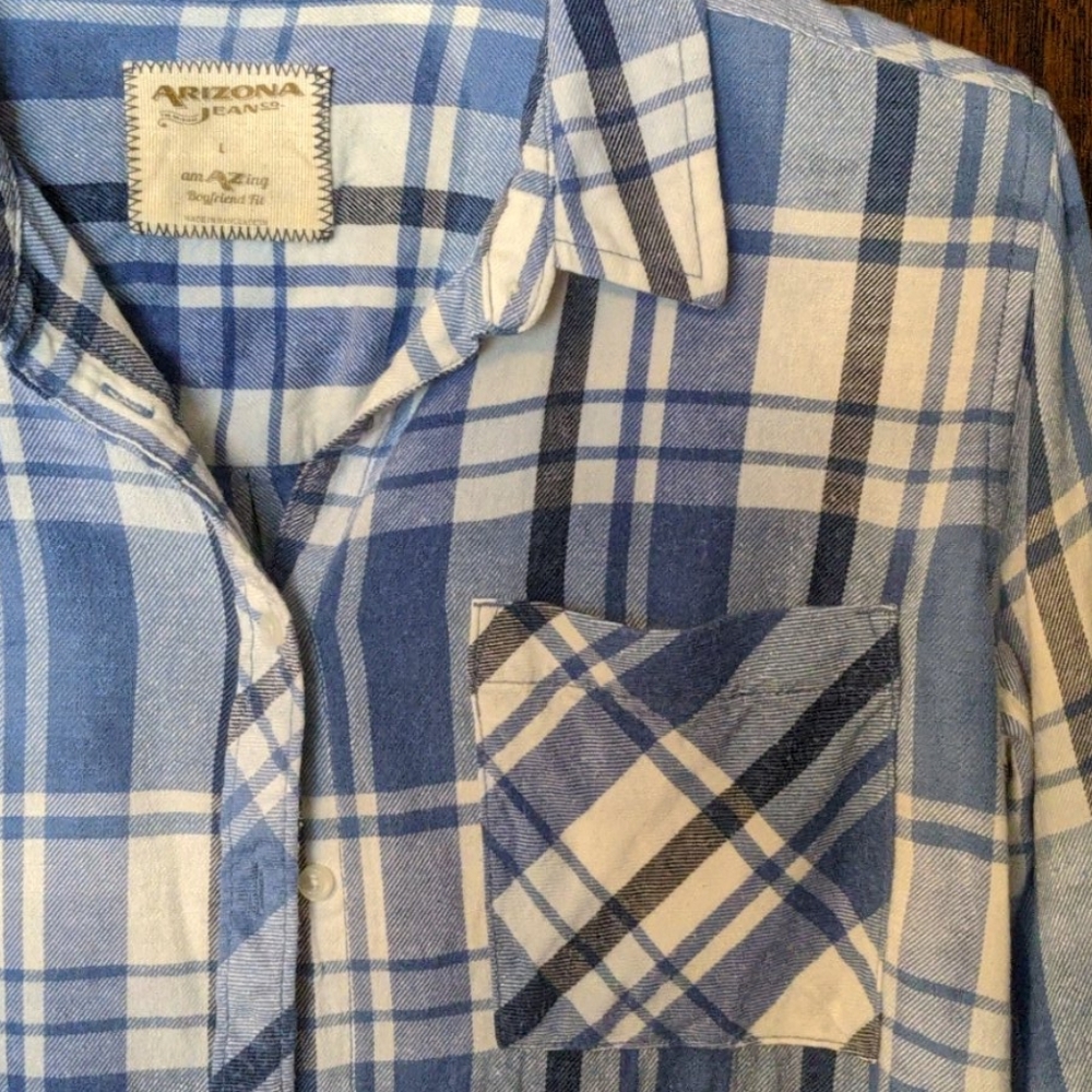 Boyfriend fit blue plaid light flannel shirt.